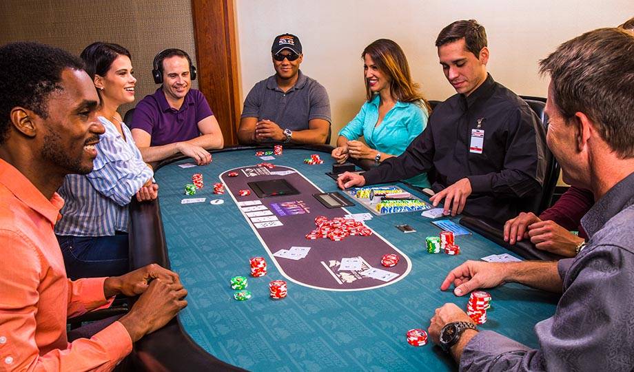 Crowded poker table, Orange City Poker Tournaments